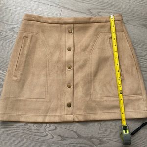 Suede a tan mini skirt from red dress boutique